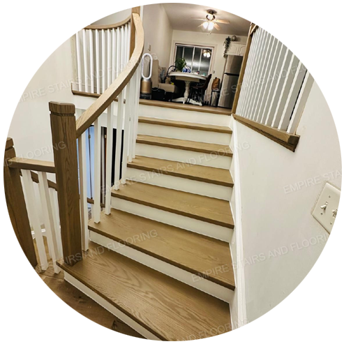 Renovated wooden stairs with white risers.